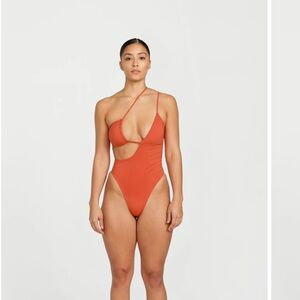 Cheeky burnt orange bathing suit